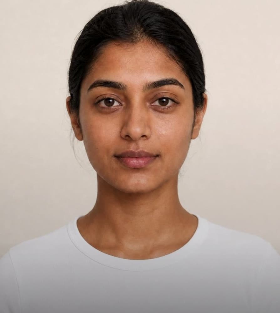 Woman with brown skin, photographed front-on for color analysis